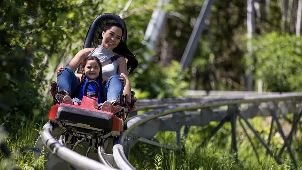Mountain coaster with passengers